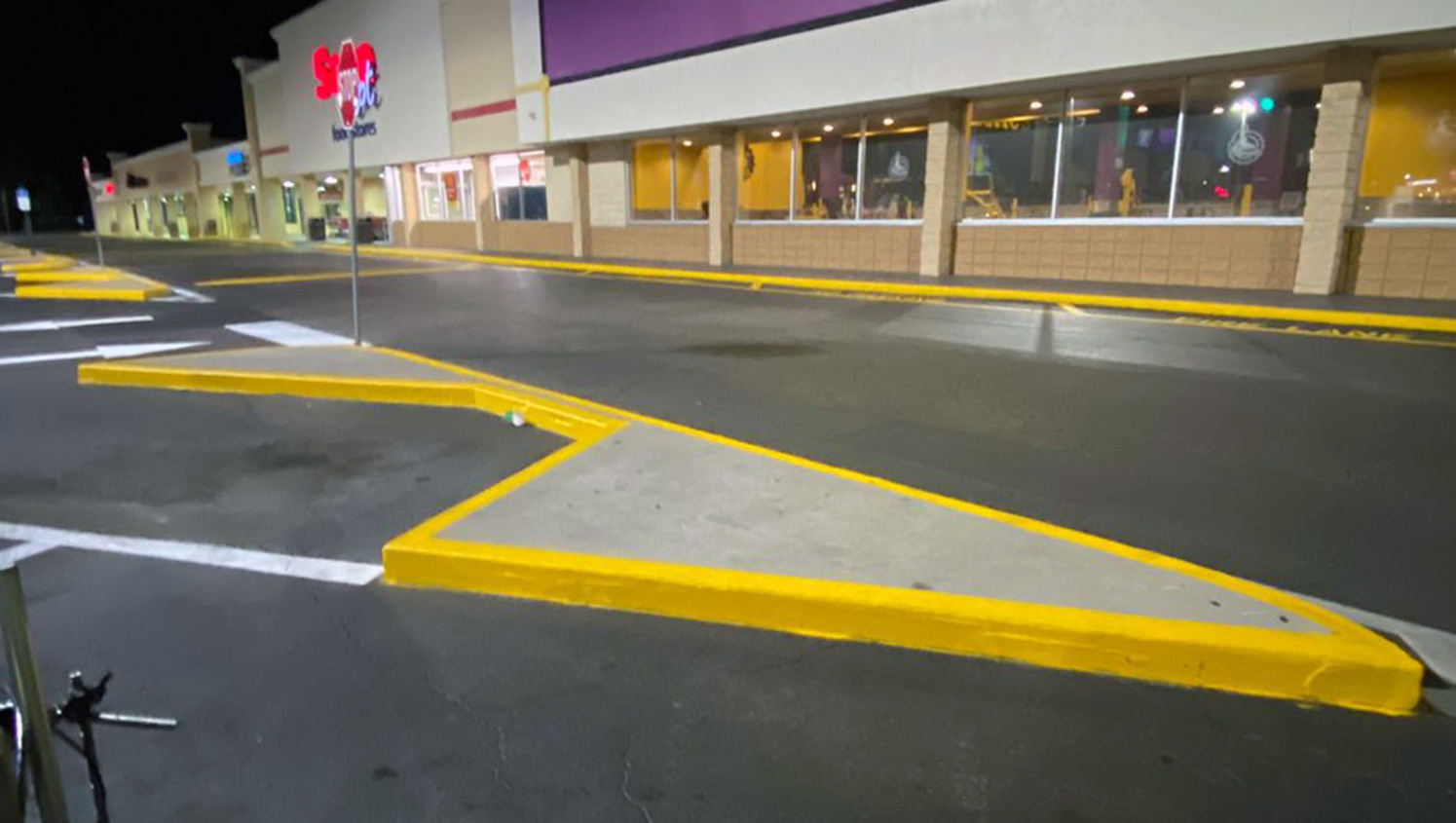 new parking lot markings at a Tampa, FL shopping plaza