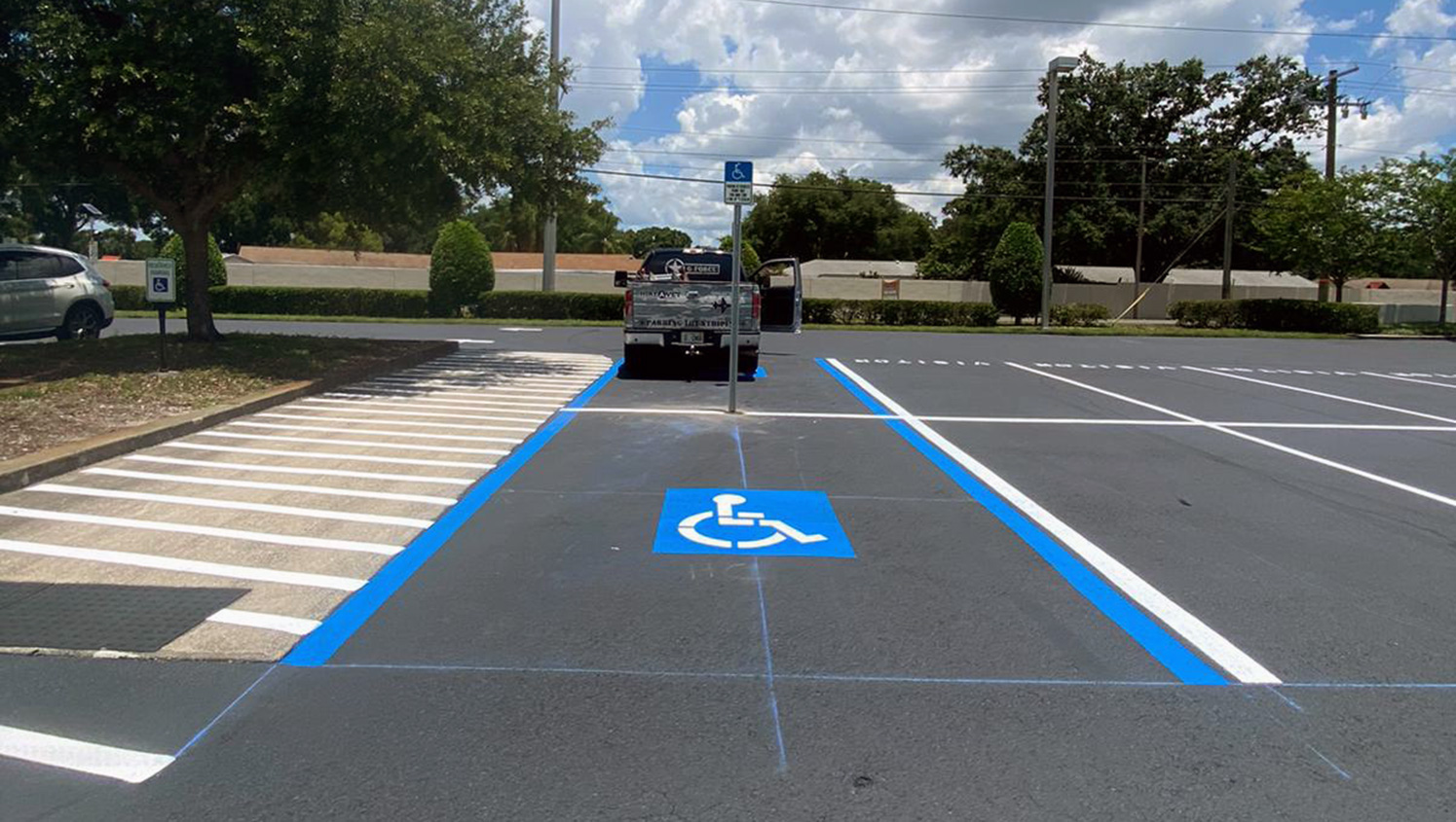 newly striped ADA accessible parking spaces at Tampa Covenant Church in Tampa, FL