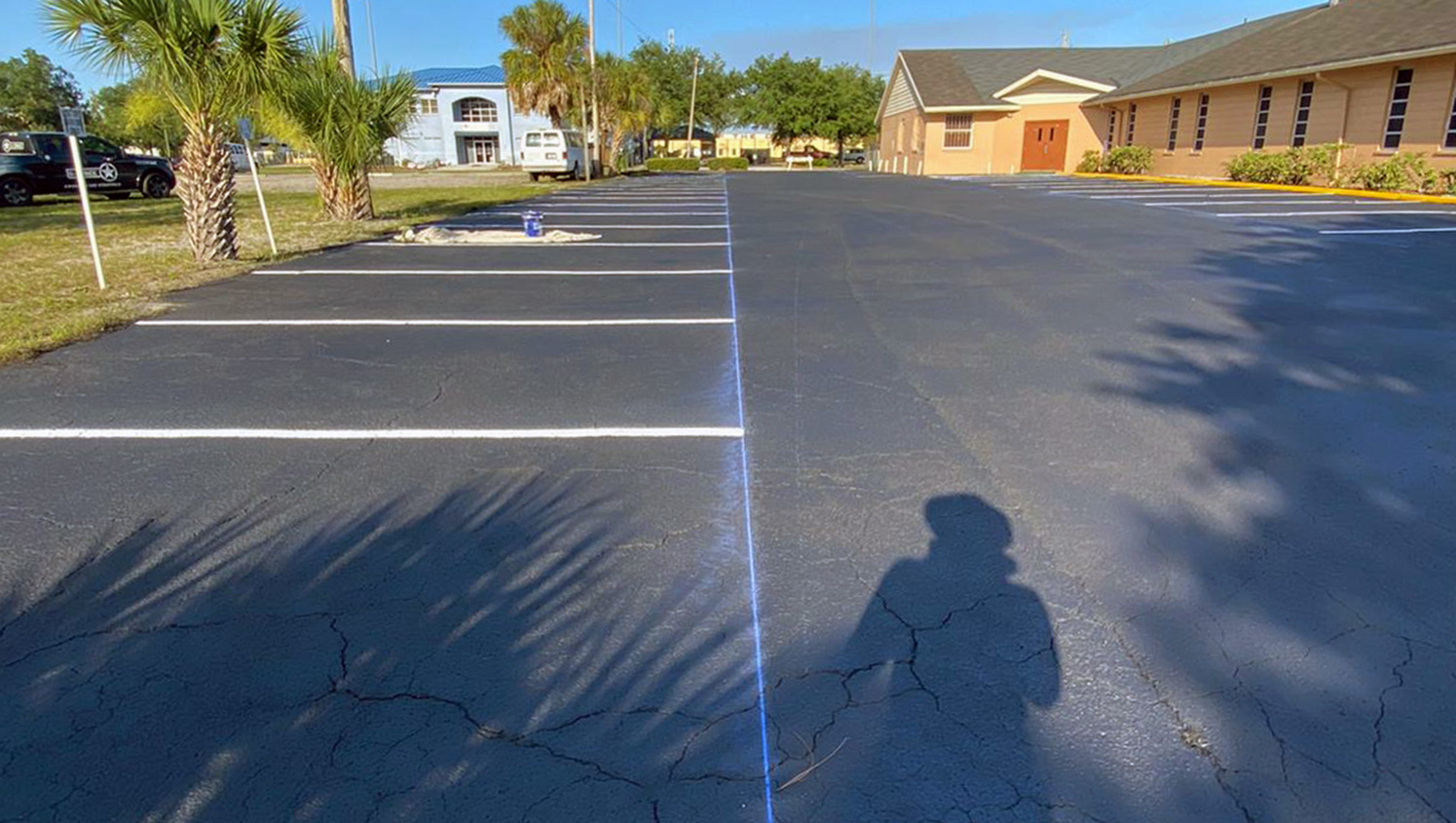 side view of freshly striped parking stalls at a Lakeland, FL church