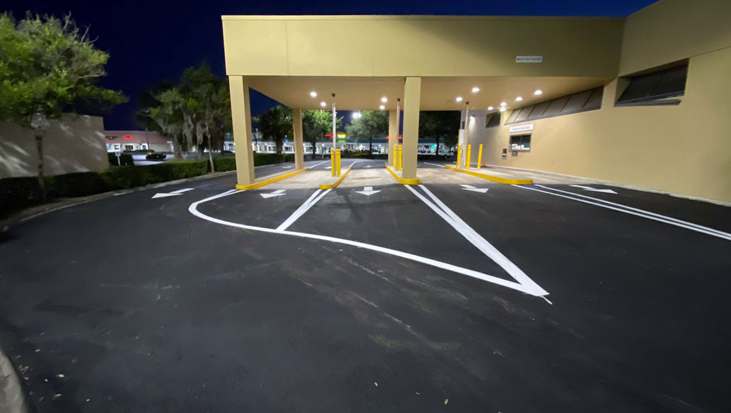 updated banking drive-thru exit lines and arrows at Wells Fargo in Sun City Center, FL