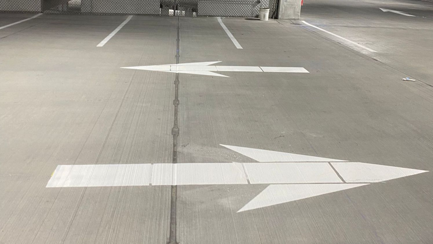 newly striped directional arrows for tampa, fl parking garage