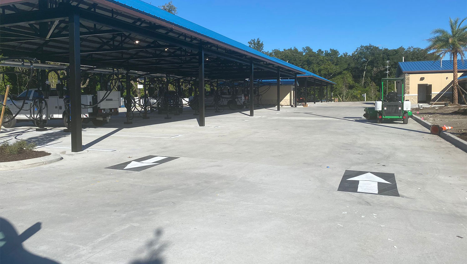 directional arrows painted in car wash parking lot
