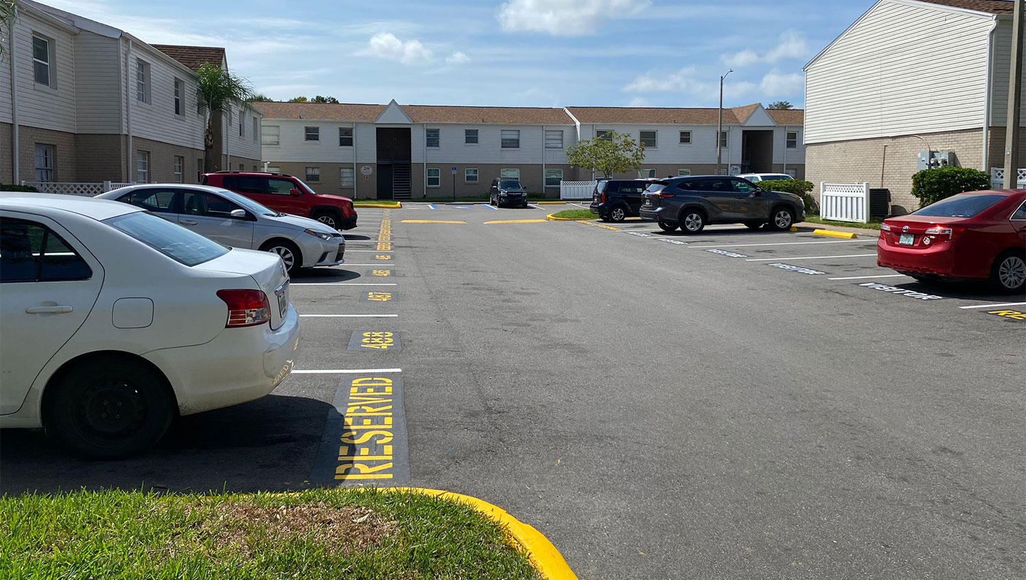 tampa apartment complex with reserved and visitor pavement markings