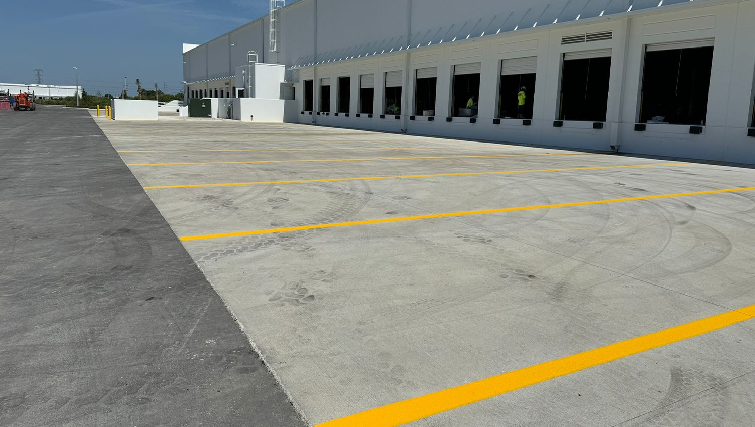 freshly painted yellow parking lot lines for business in st.petersburg