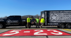 three men at first airfield striping project in alabama