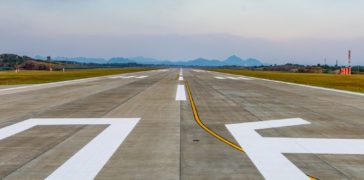 new airport runway markings striped on a pavement
