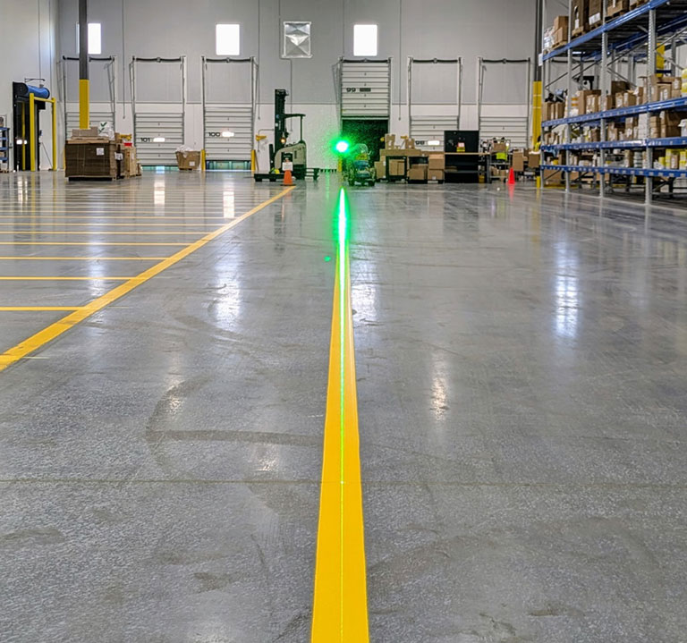 warehouse floor striper in progress