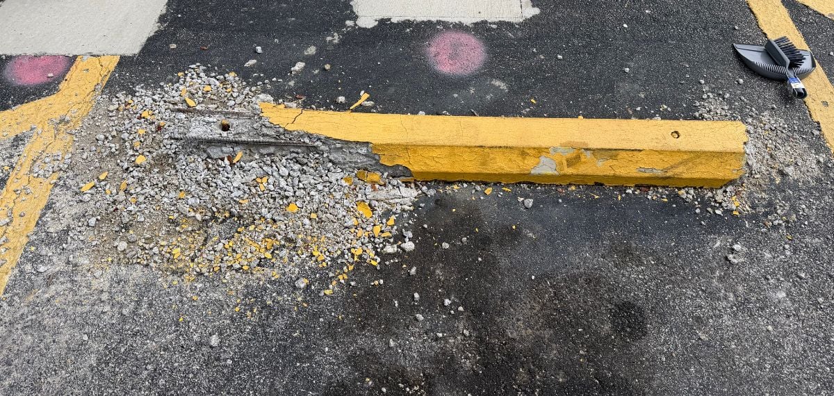 crumbling concrete wheel stop
