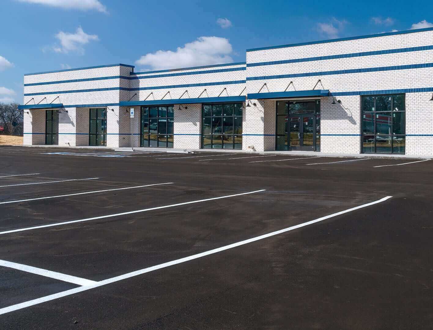 striped commercial facility parking lot